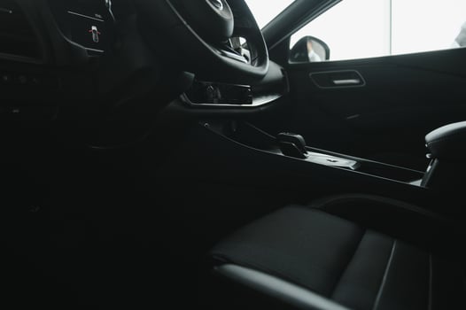 car interior. Modern car speedometer and illuminated dashboard. Luxurious car instrument cluster. Close up shot of hybrid car instrument panel photo