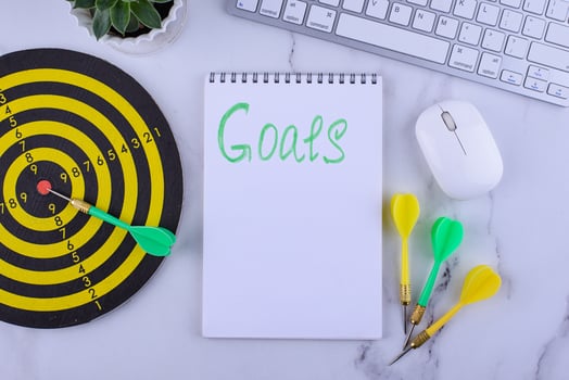 Target and goal concept with darts and arrows photo