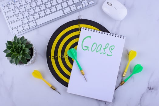 Target and goal concept with darts and arrows photo