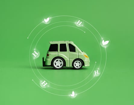 Ecology concept. Green car and environmental signs on a green background. Environment concept. photo