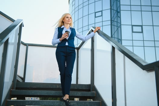 Business Women Style. Woman Going To Work. Portrait Of Beautiful Female In Stylish Office. photo