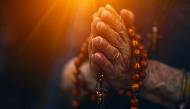 AI generated hands holding a rosary while praying photo