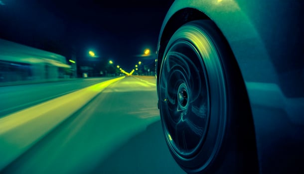 Blured car motion at night The car sped along the road photo