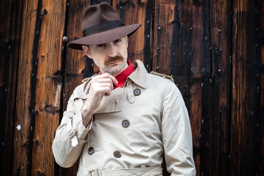 Portrait of a detective with folded arms in a ghetto photo