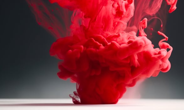 AI Generated Red ink in water on white background photo