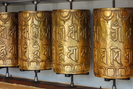 Buddhist prayer wheels photo