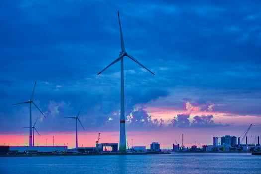 Wind turbines in Antwerp port in the evening photo