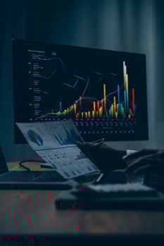 Thoughtful focused successful caucasian male stock investor, broker, financial adviser, sits at work desk, looks at computer, pensively analyze risks and prospects, rise or fall of cryptocurrency coin photo