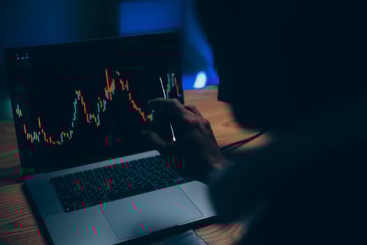 Thoughtful focused successful caucasian male stock investor, broker, financial adviser, sits at work desk, looks at computer, pensively analyze risks and prospects, rise or fall of cryptocurrency coin photo