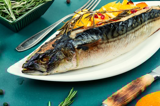 Mackerel baked with oranges, scomber roast. photo