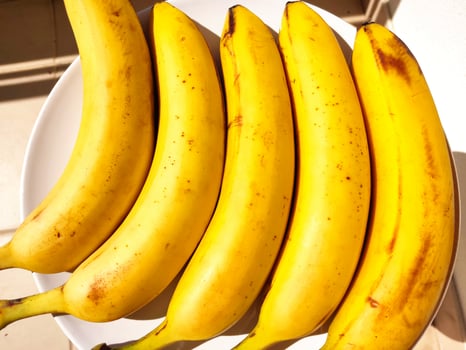 Ripe bananas. Exotic tropical yellow fruit. Banana symbol of health care and wellbeing. photo