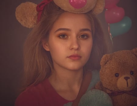 AI generated Portrait of a girl with a toy bear. photo