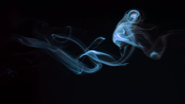 blue smoke, vapor , fog cloud on black background for using in composition and overlay photo