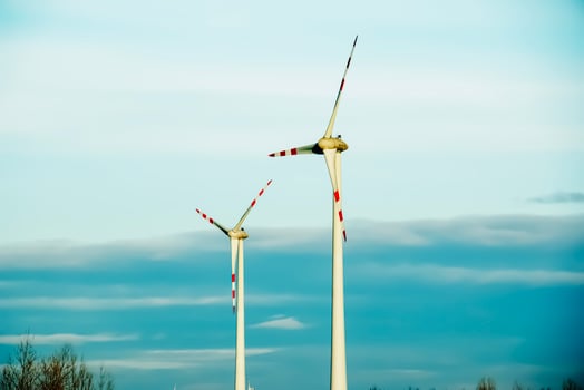Wind farm park next to a road in Austria in sunny weather. photo