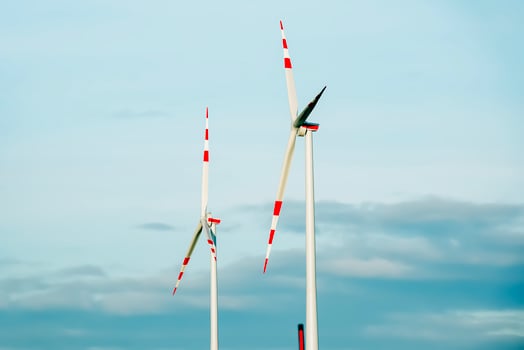 Wind farm park next to a road in Austria in sunny weather. photo