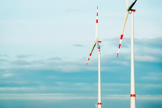 Wind farm park next to a road in Austria in sunny weather. photo