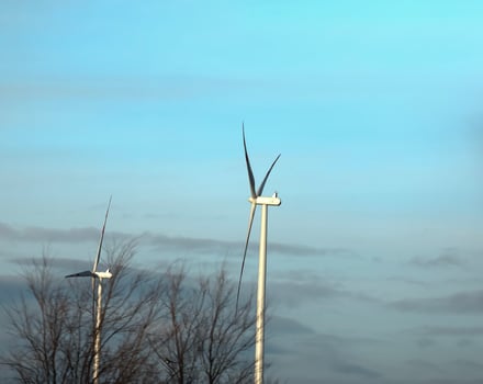 Wind farm park next to a road in Austria in sunny weather. photo