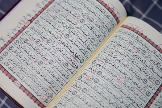 Quran, Al Qur'an, Islamic background for Eid al-Fitr Eid al-Adha. Open page of Al-Quran. Islamic concept photo