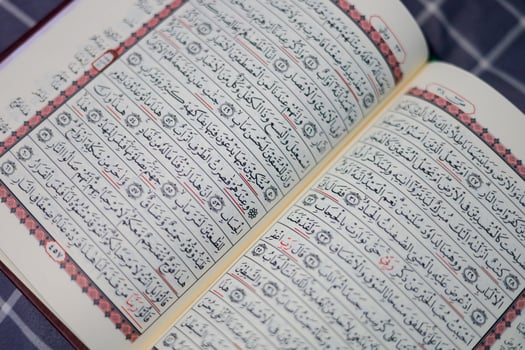 Quran, Al Qur'an, Islamic background for Eid al-Fitr Eid al-Adha. Open page of Al-Quran. Islamic concept photo