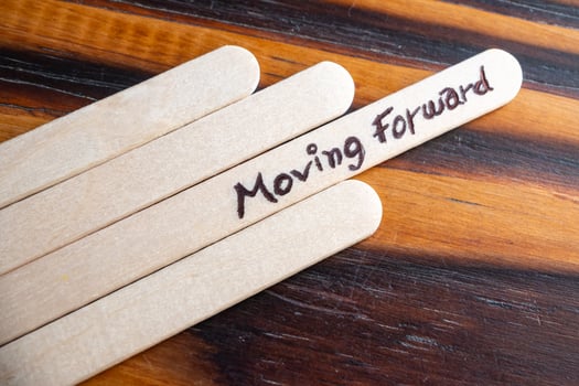 Always moving forward concept made with ice cream sticks. photo