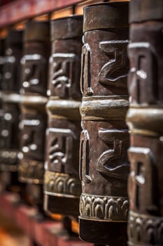 Buddhist prayer wheels photo