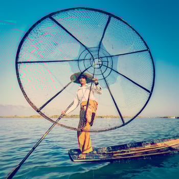 Traditional Burmese fisherman at Inle lake Myanmar photo