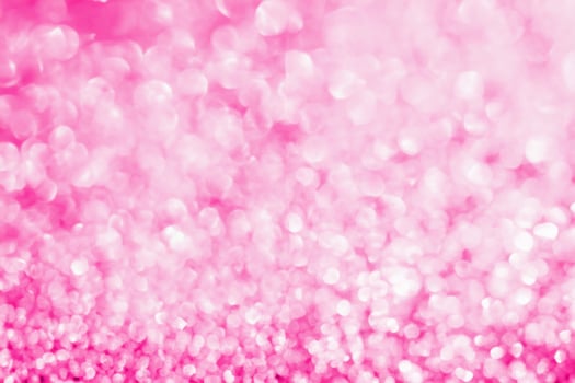 Abstract blur pink glitter sparkle defocused bokeh light background photo