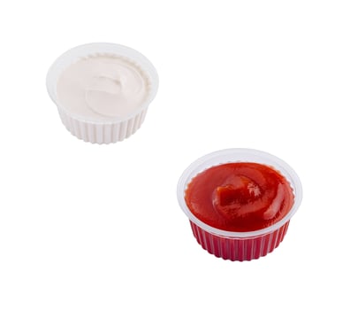 spicy tomato and mayonnaise sauces in a transparent casserole photo