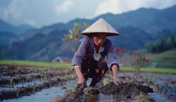 AI generated woman in traditional asian attire plowing in a rice field photo