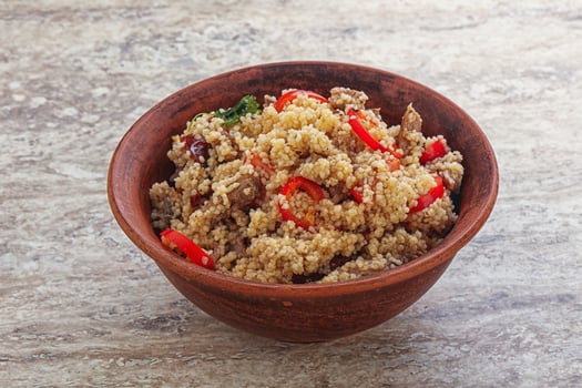 Arabic cous cous with meat and tomato photo