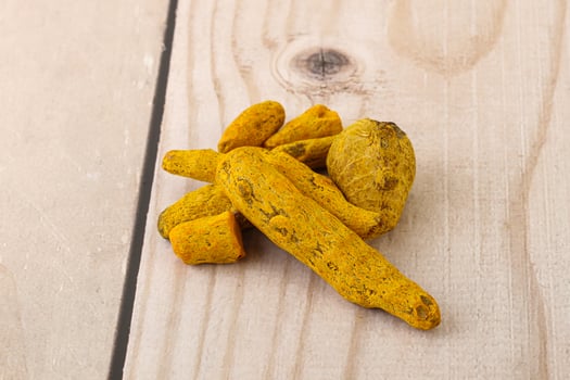 Indian spices - Turmeric root Curcuma photo