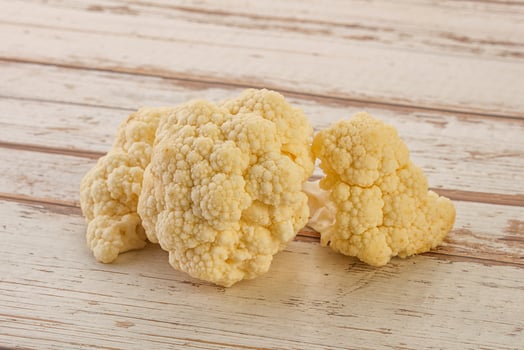 Raw white cauliflower cabbage heap photo