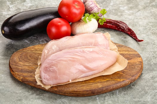 Raw chicken breast for cooking photo