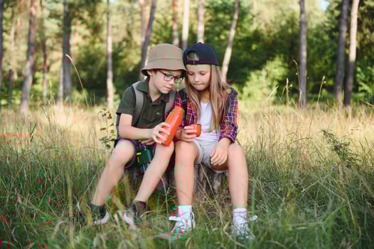 kids scouts in the forest. photo