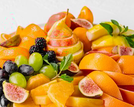Exotic fruits platter isolated on white photo