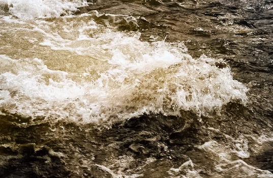 Mountain river. Stones and water of mountain river. The mountains are said. photo