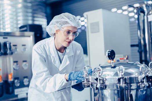 staff work in science medical lab factory check record pressure tank happy working photo