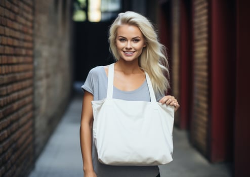 AI generated woman holding a tote bag against brick wall photo