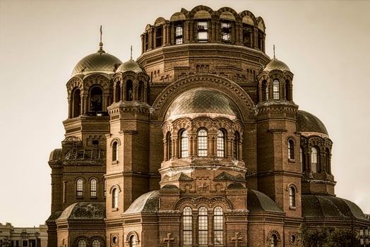 Holy Trinity Cathedral. Christian orthodox church. Beautiful large white building with golden domes and crosses. Russian Orthodox Church. Magadan, Siberia, Far East of Russia. photo