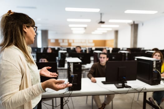 Hispanic teacher doing lecture in high school - Education concept photo