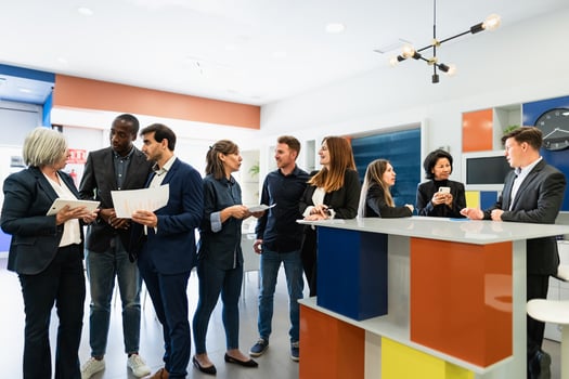 Multiracial business team working together in a boardroom of modern office - Entrepreneurship concept photo