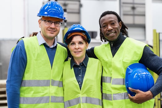 Team of engineers working inside robotic factory - Industry concept photo
