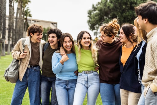 Happy group of teenagers having fun outside university - Young students people lifestyle concept photo