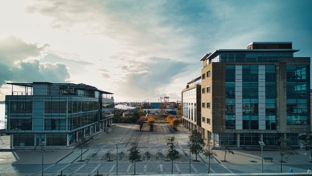 Modern office buildings with glass facades at sunset, urban landscape in Hull, England. photo