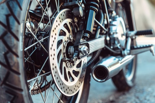 AI generated Close Up of Motorcycle Tire and Disc Brakes photo