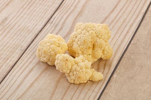 Raw white cauliflower cabbage heap photo