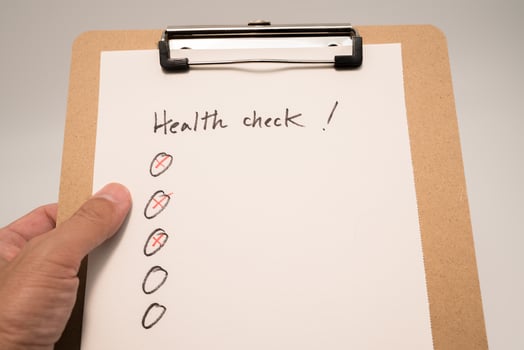 Check list on white paper photo