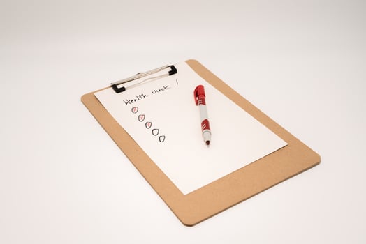 Check list on white paper photo