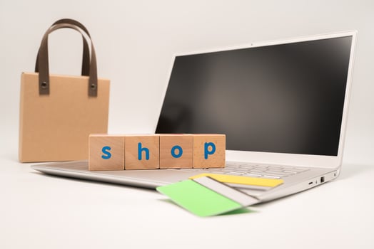 Brown bag shopping putting on computer photo