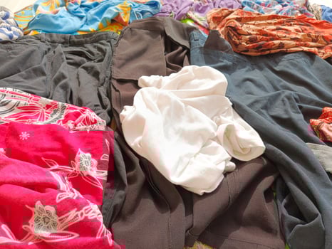 Photo of a collection of clothes spread out or stacked